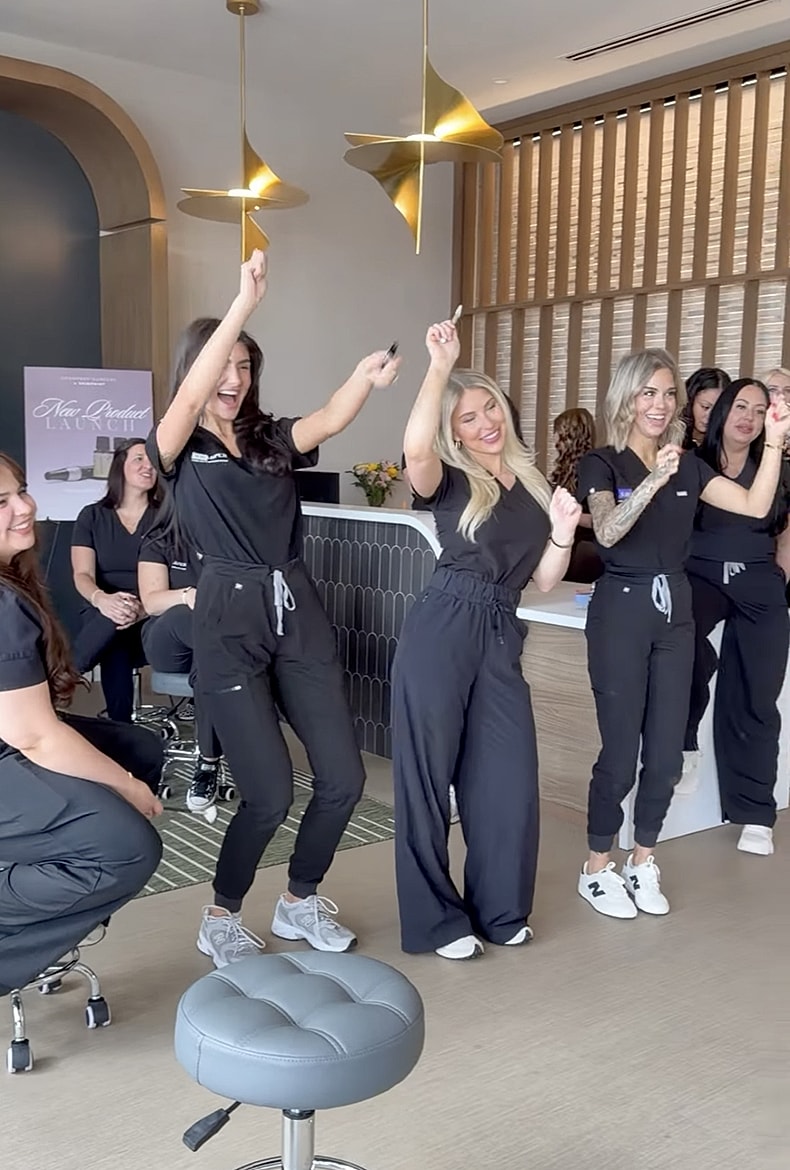 Team celebrating a new product launch together.