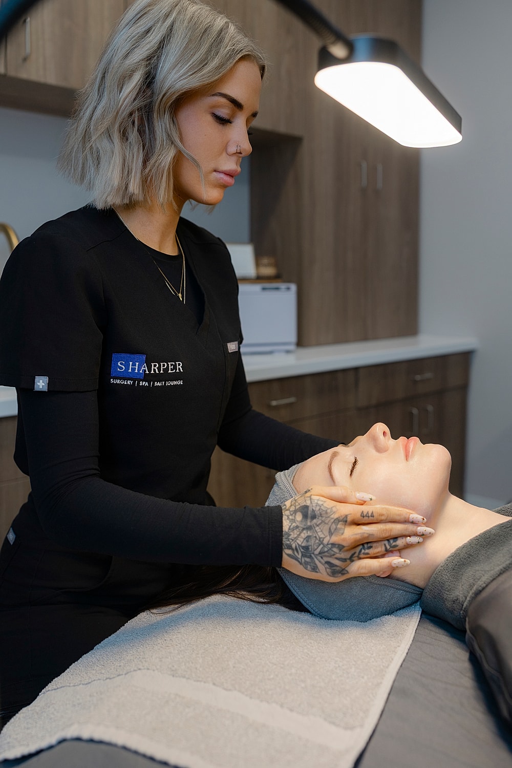 indianapolis liquid facelift patient looking into mirror