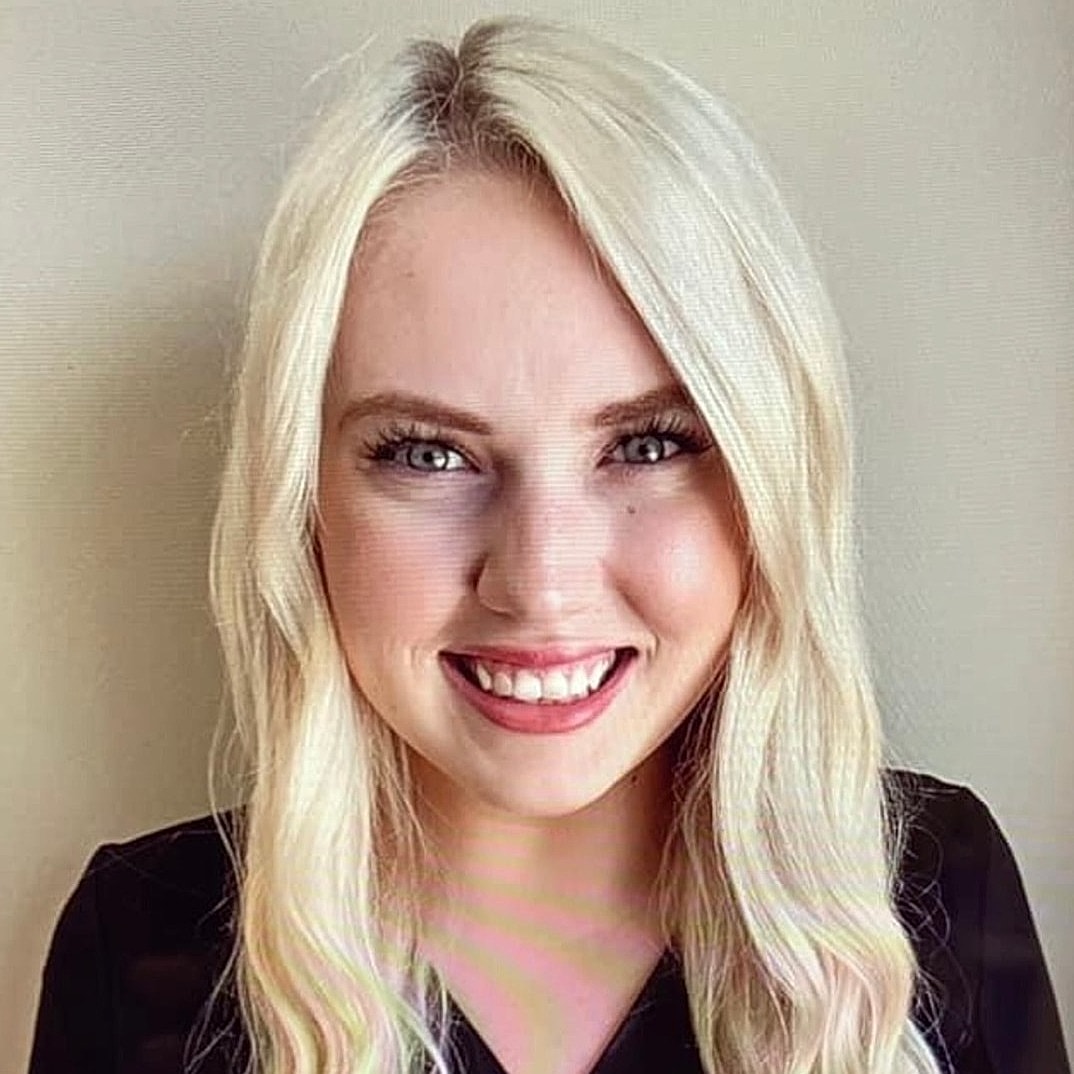 Silhouette of a woman with long hair.
