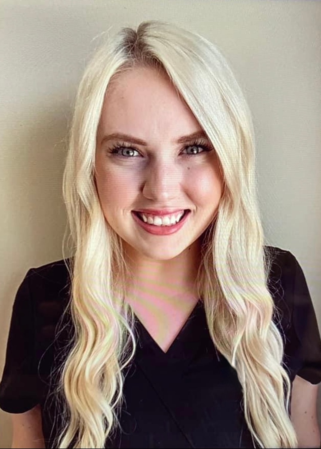 Silhouette of a woman with long hair.