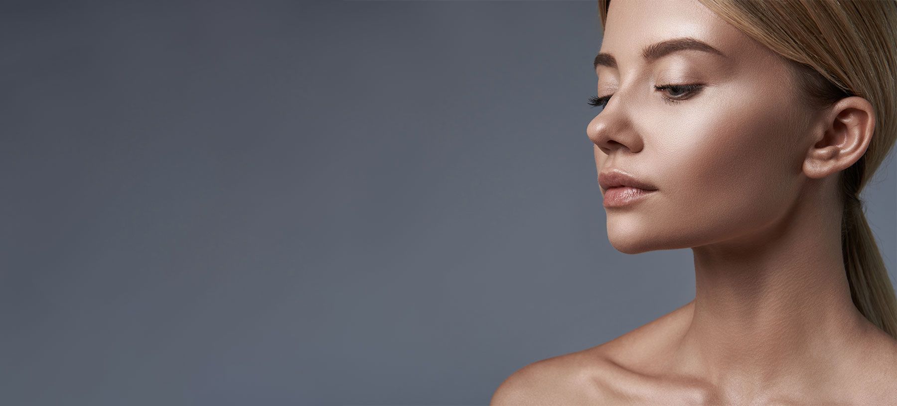 Profile of a woman with smooth skin.